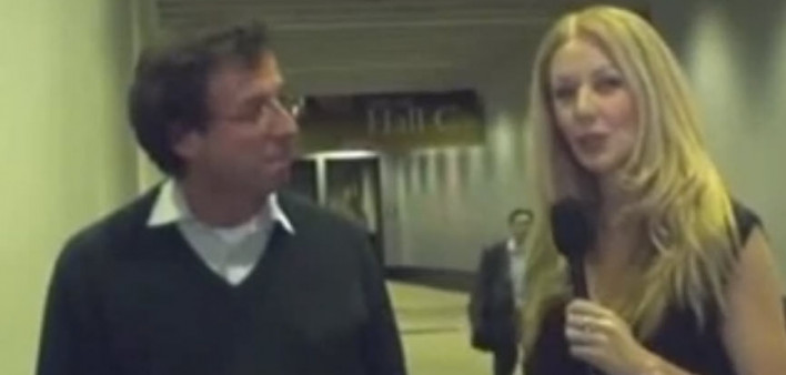 POZ editor-in-chief Regan Hofmann talks with Bernard Hirschel, MD, of the University Hospital, Geneva, Switzerland