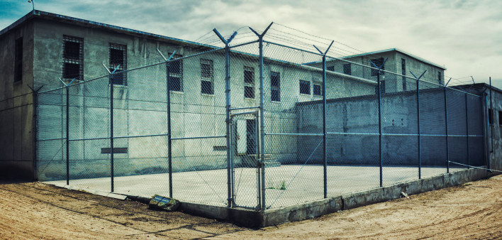 prison yard barbed wire fence