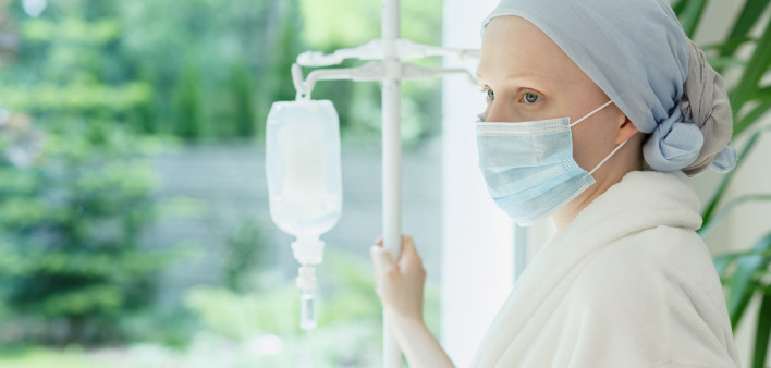 Woman with cancer chemo face mask