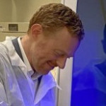 Marc Romney, MD, with the Roche system now used to test for COVID-19