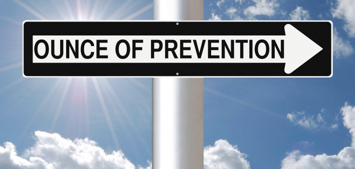 Ounce of Prevention sign against a blue sky