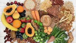 food with high fiber content for a healthy diet with fruit, vegetables, whole wheat bread, pasta, nuts, legumes, grains and cereals