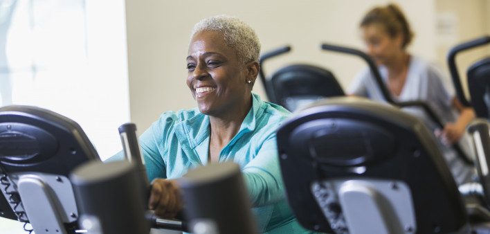 older woman on exercise bike