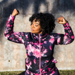 Funny portrait of a young black curvy woman during a training session