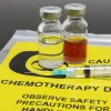 A syringe and two vials of chemotherapy drugs