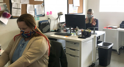 BASC team members Loretta Lovett and Jennifer Abarca wear their new masks