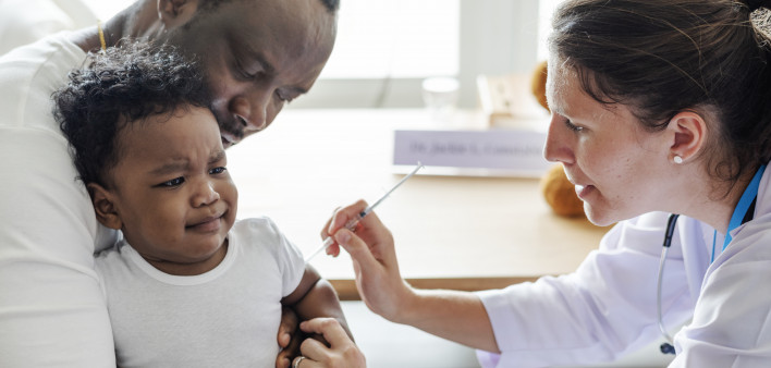 Baby getting a first injection