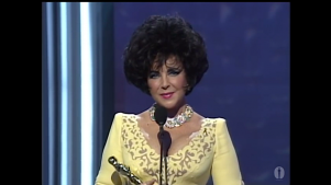 Elizabeth Taylor receives the Jean Hersholt Humanitarian Award at the 1993 Academy Awards