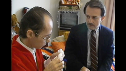 Hank Plante reporting at the bedside of a person living with AIDS in San Francisco in the 1980s