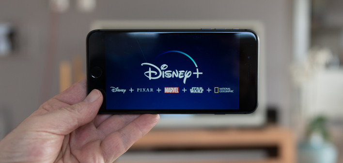 Disney+ startscreen on mobile phone. Disney+ online video, content streaming subscription service. Disney plus, Star wars, Marvel, Pixar, National Geographic.