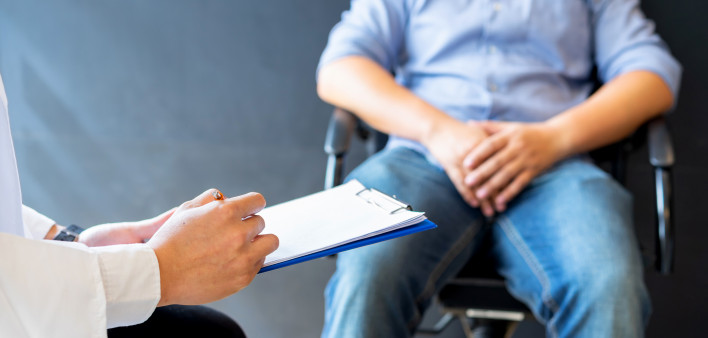 Male doctor and prostate cancer patient are discussing about prostate cancer test report. Diagnostic, prevention of men diseases,