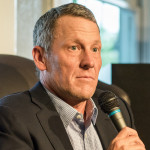 Former cyclist Lance Armstrong speaks at an event at the University of Texas in Austin, Texas.
