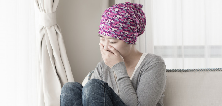 poor cancer woman feel bad at home