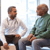 doctor taking to patient
