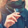 Young woman enjoying a cigarette