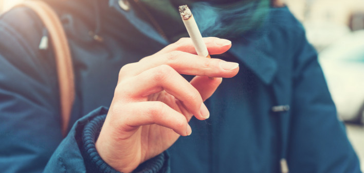 Young woman enjoying a cigarette