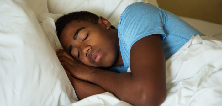 Teenage Boy Sleeping in bed