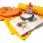 beach blanket flip flops sun glasses