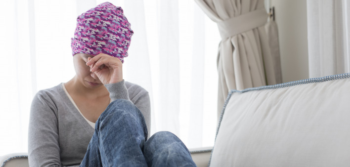 poor cancer woman feel bad at home