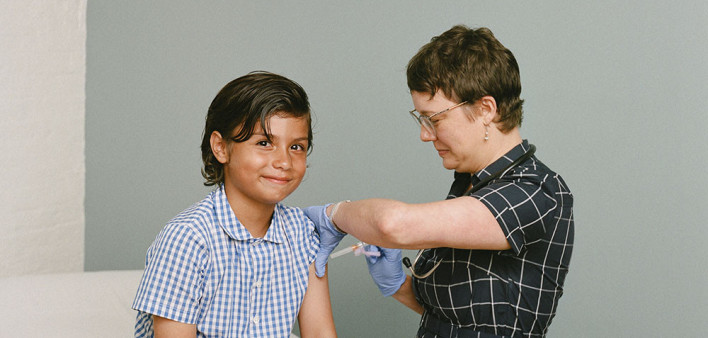 boy receives a vaccine