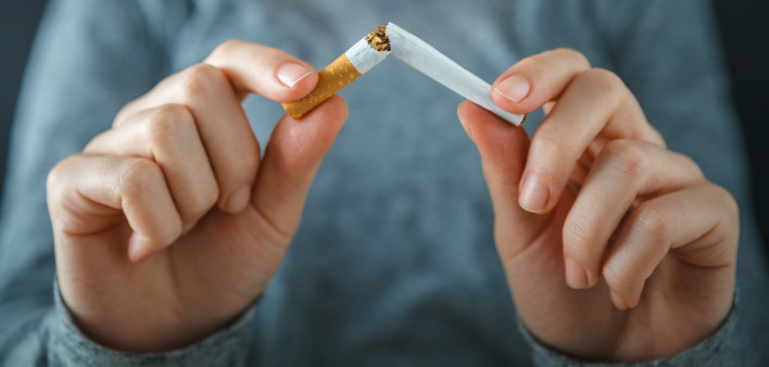 hands break cigarette quite smoking