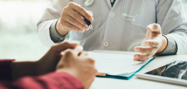 Doctor talking to the patient about menopause and treatment in future.