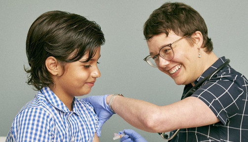 boy receiving a vaccine