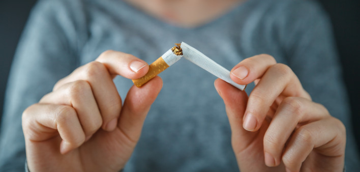 hands break cigarette quite smoking