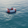 a life preserver floats in the water