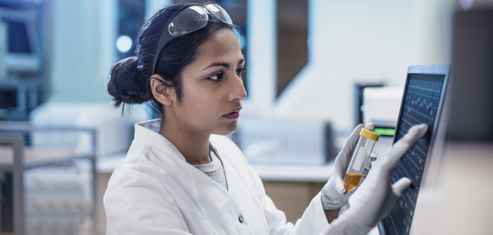 Female Scientist Working in The Lab, Using Computer Screen