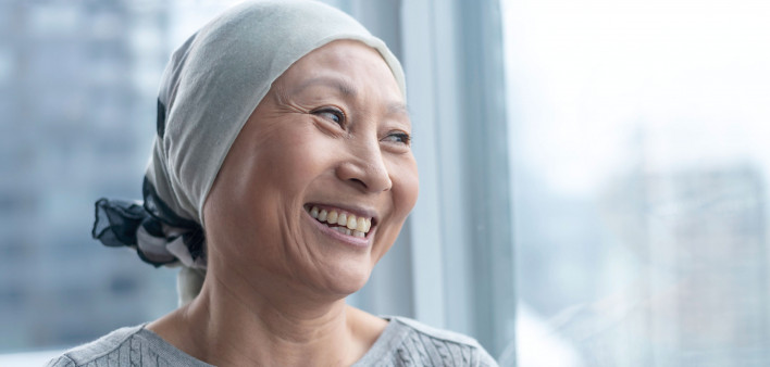 woman with cancer wearing head scarf