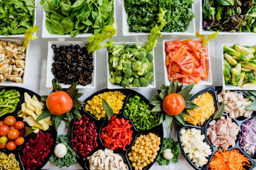 trays with chopped healthy food